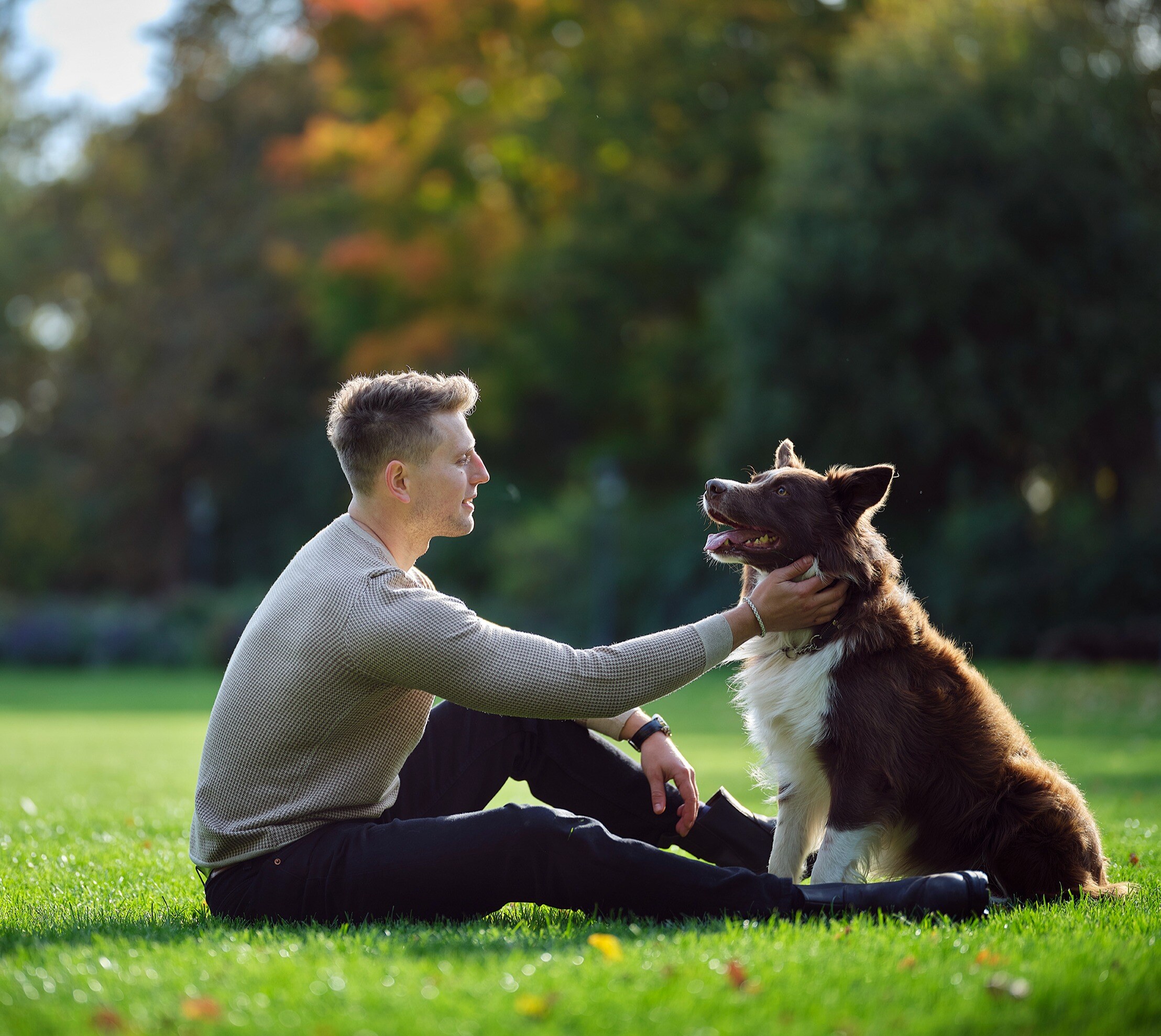Man with dog on grass